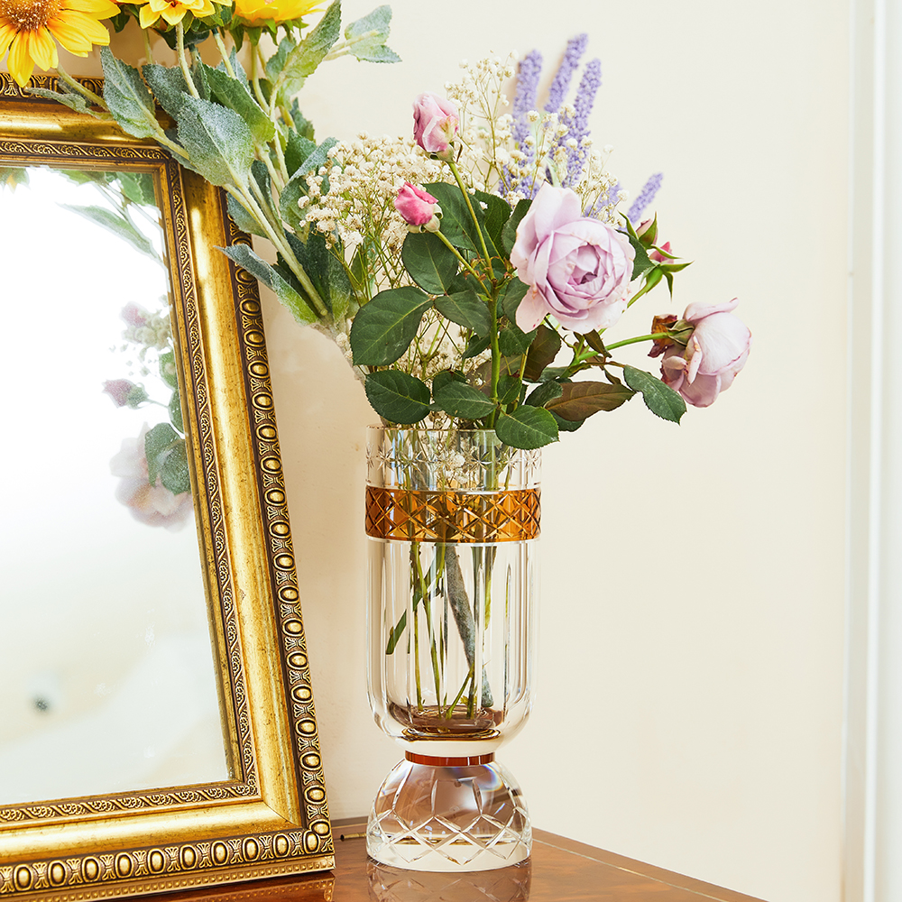 Round carved crystal vase